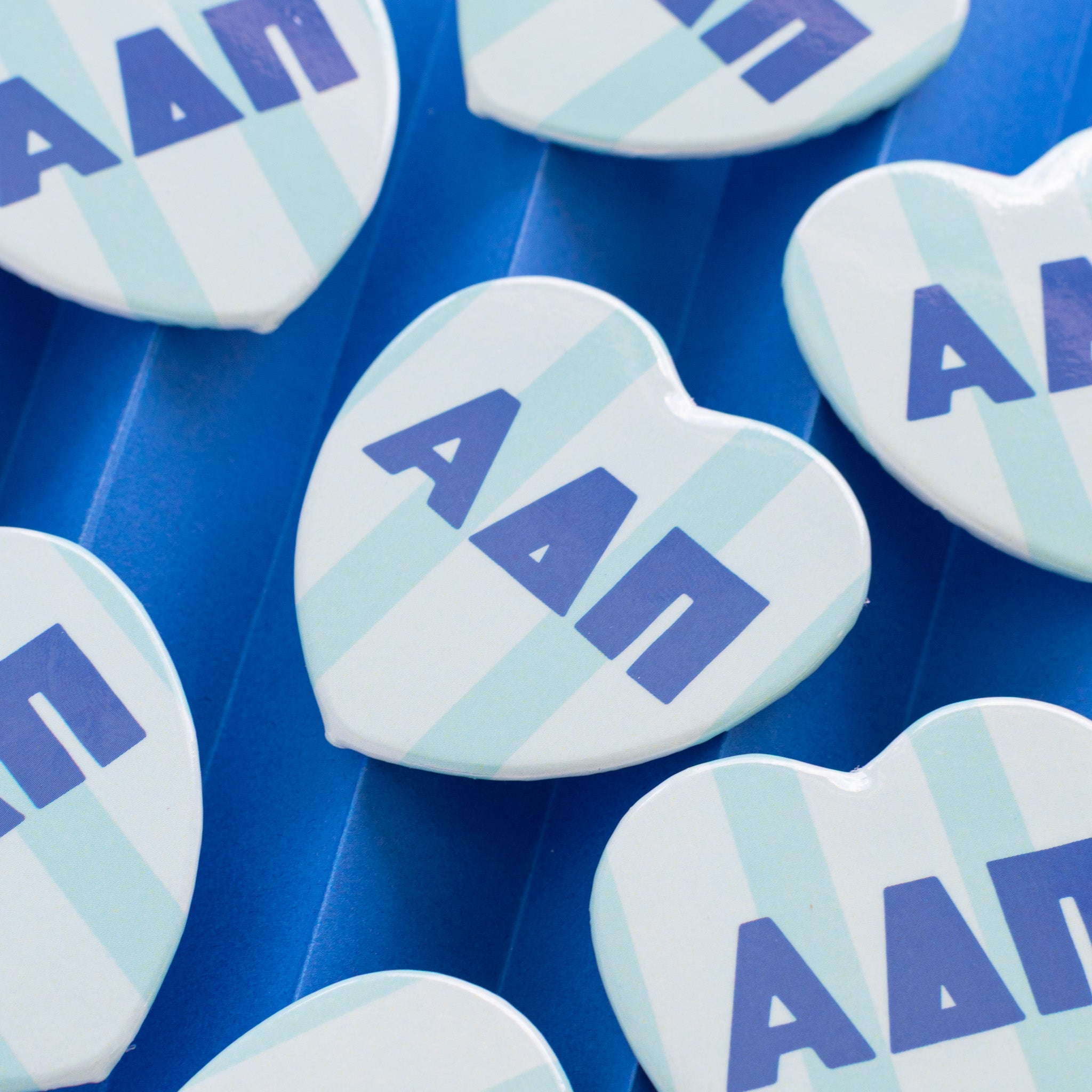 Stripe heart buttons