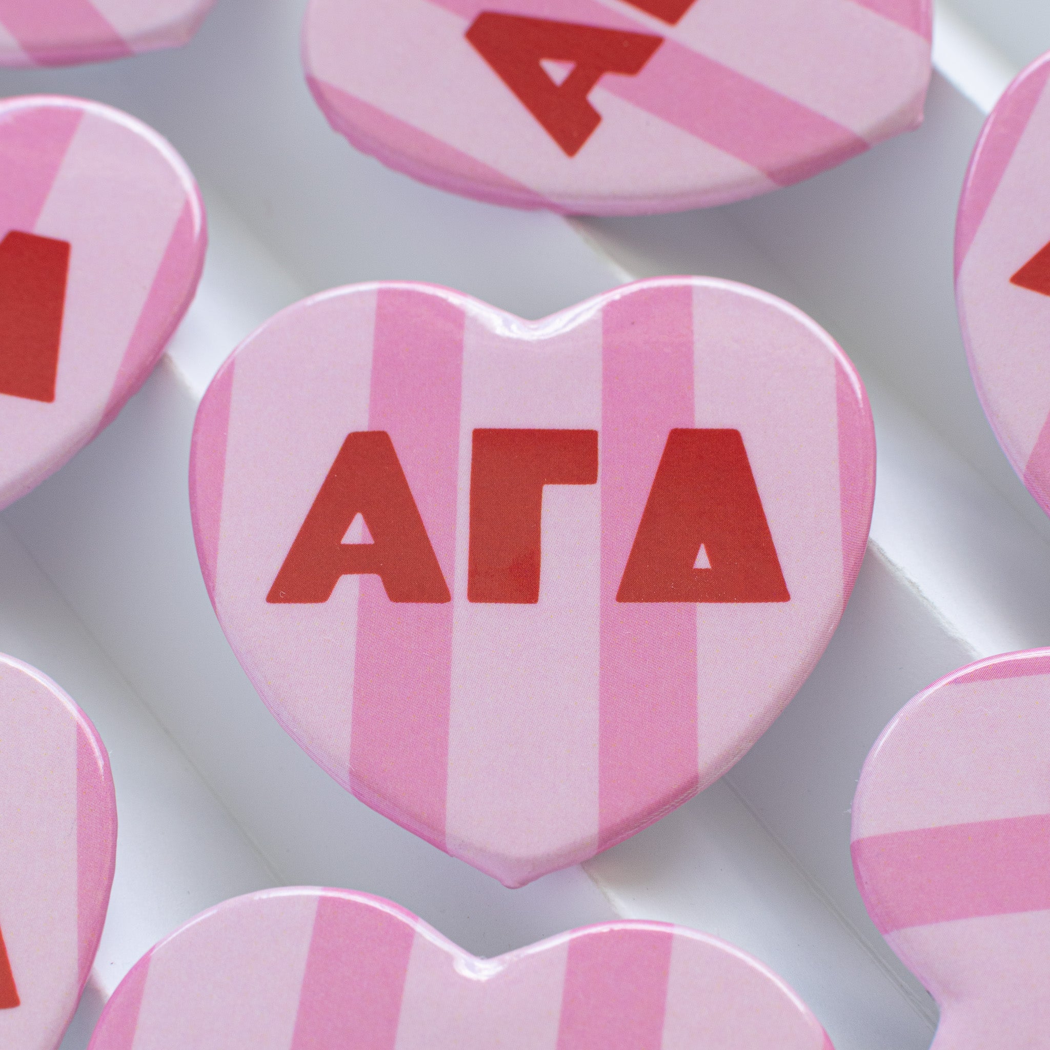 Stripe heart buttons
