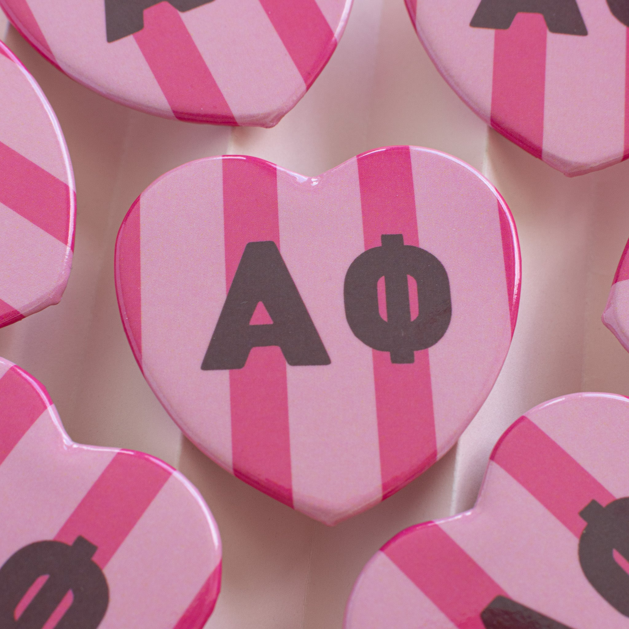 Stripe heart buttons