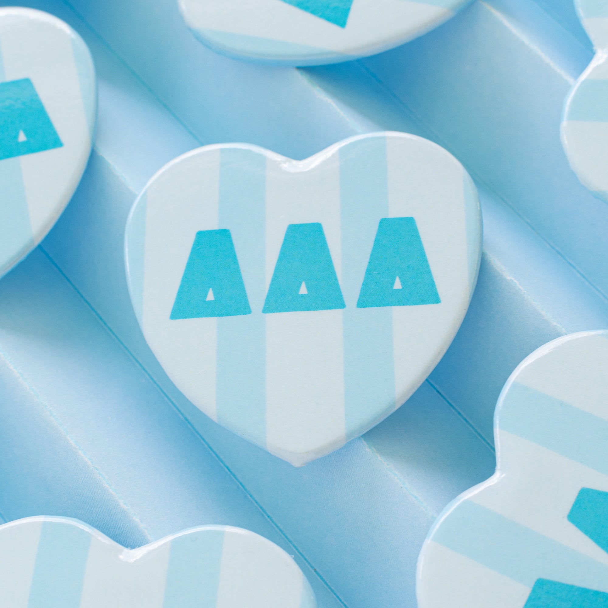 Stripe heart buttons