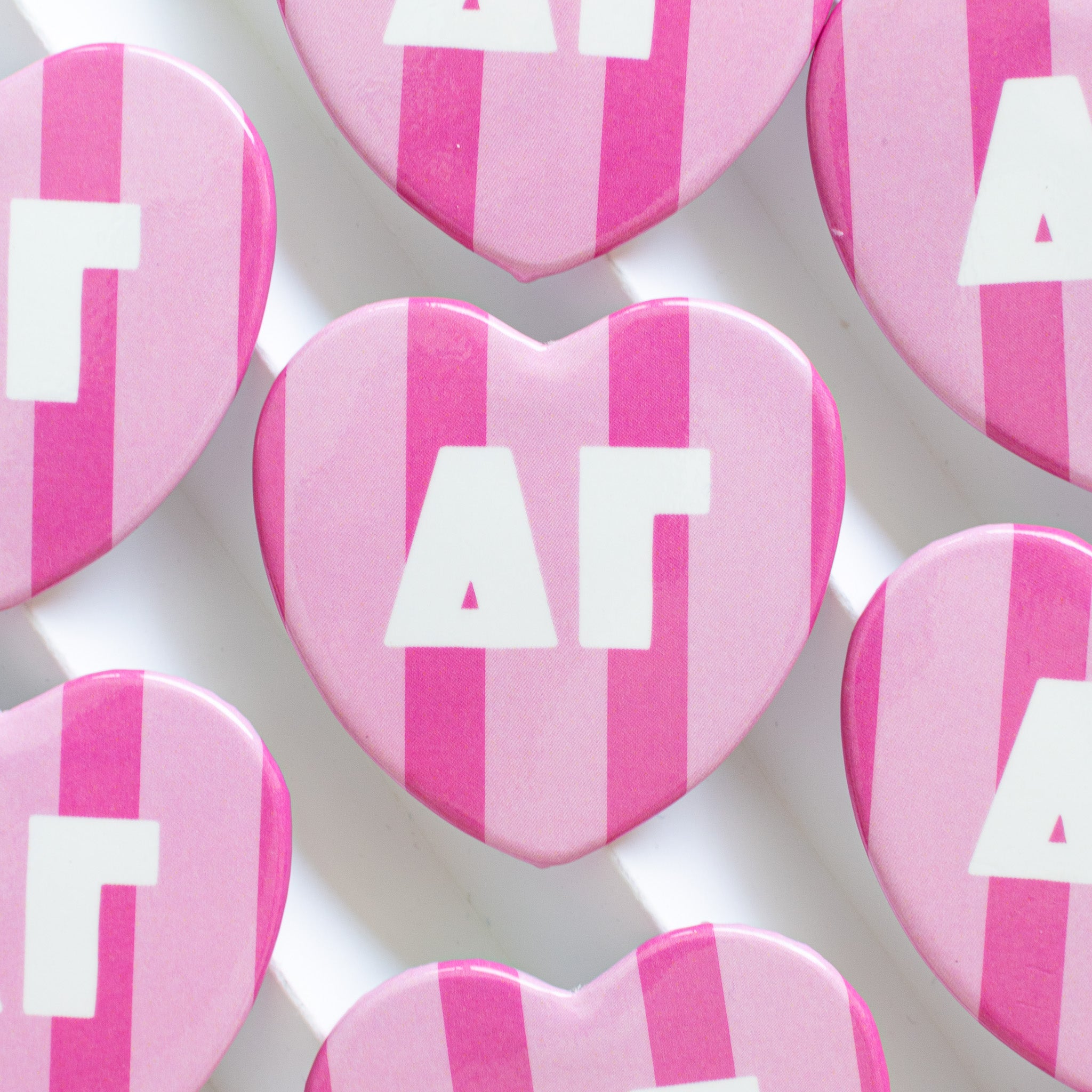 Stripe heart buttons