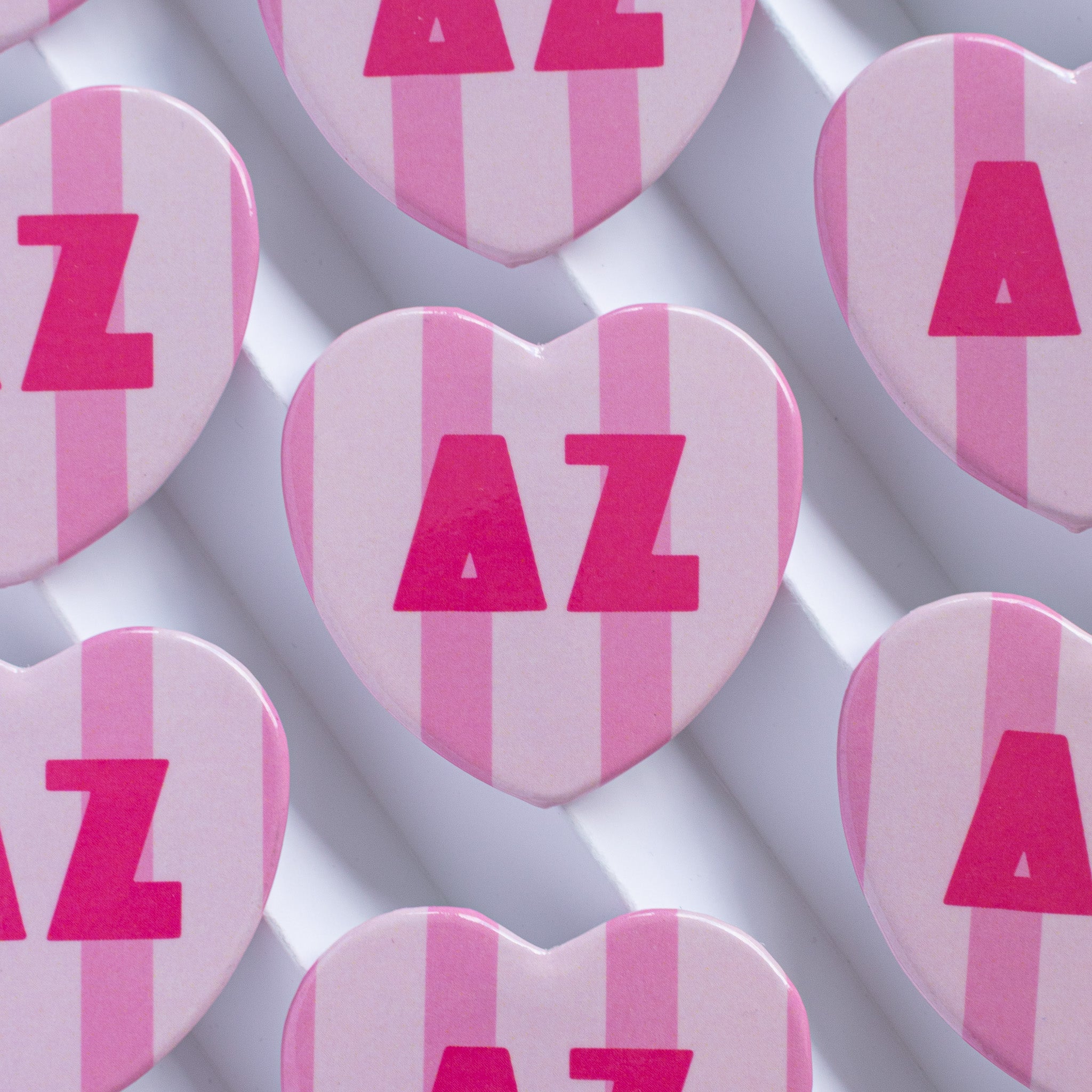 Stripe heart buttons