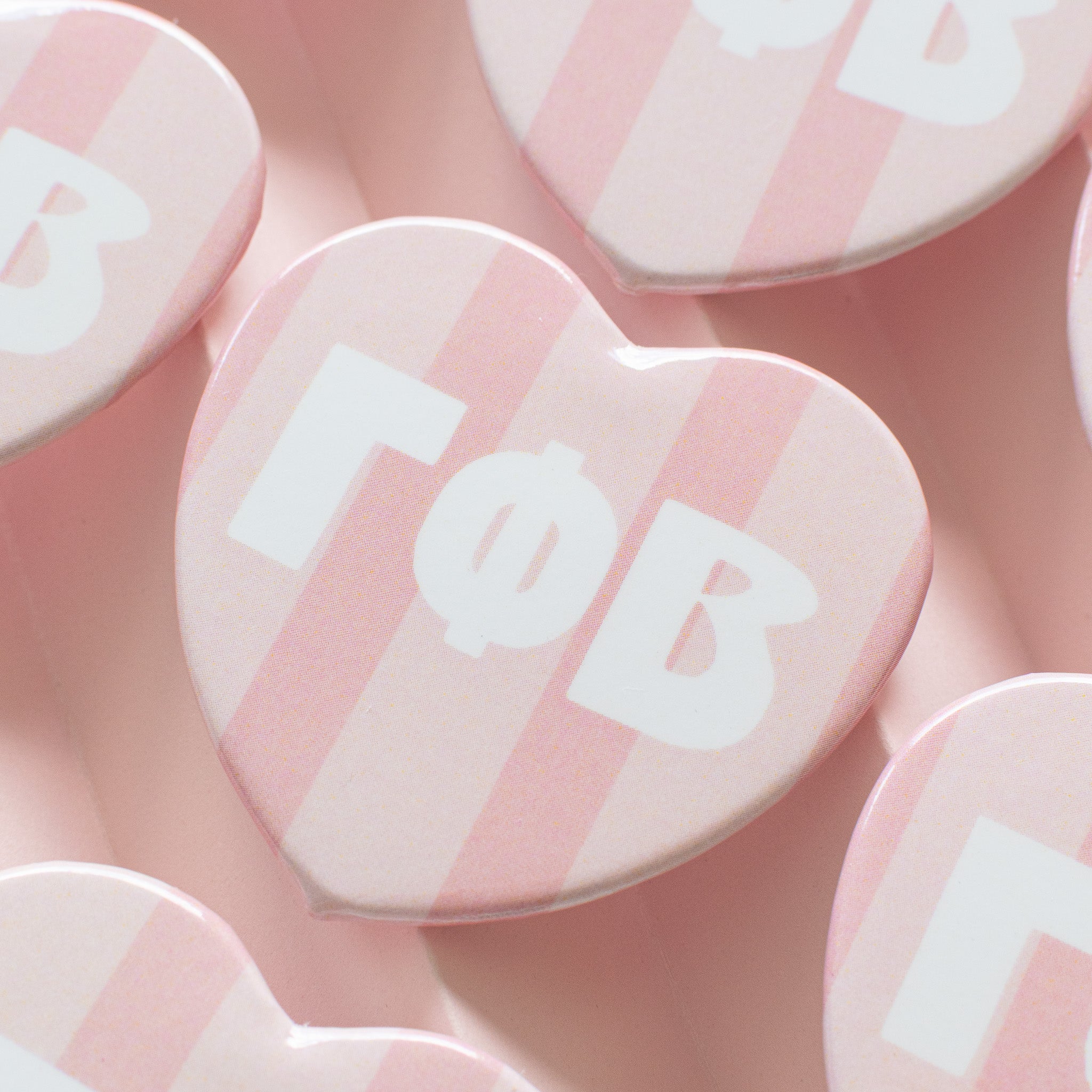 Stripe heart buttons