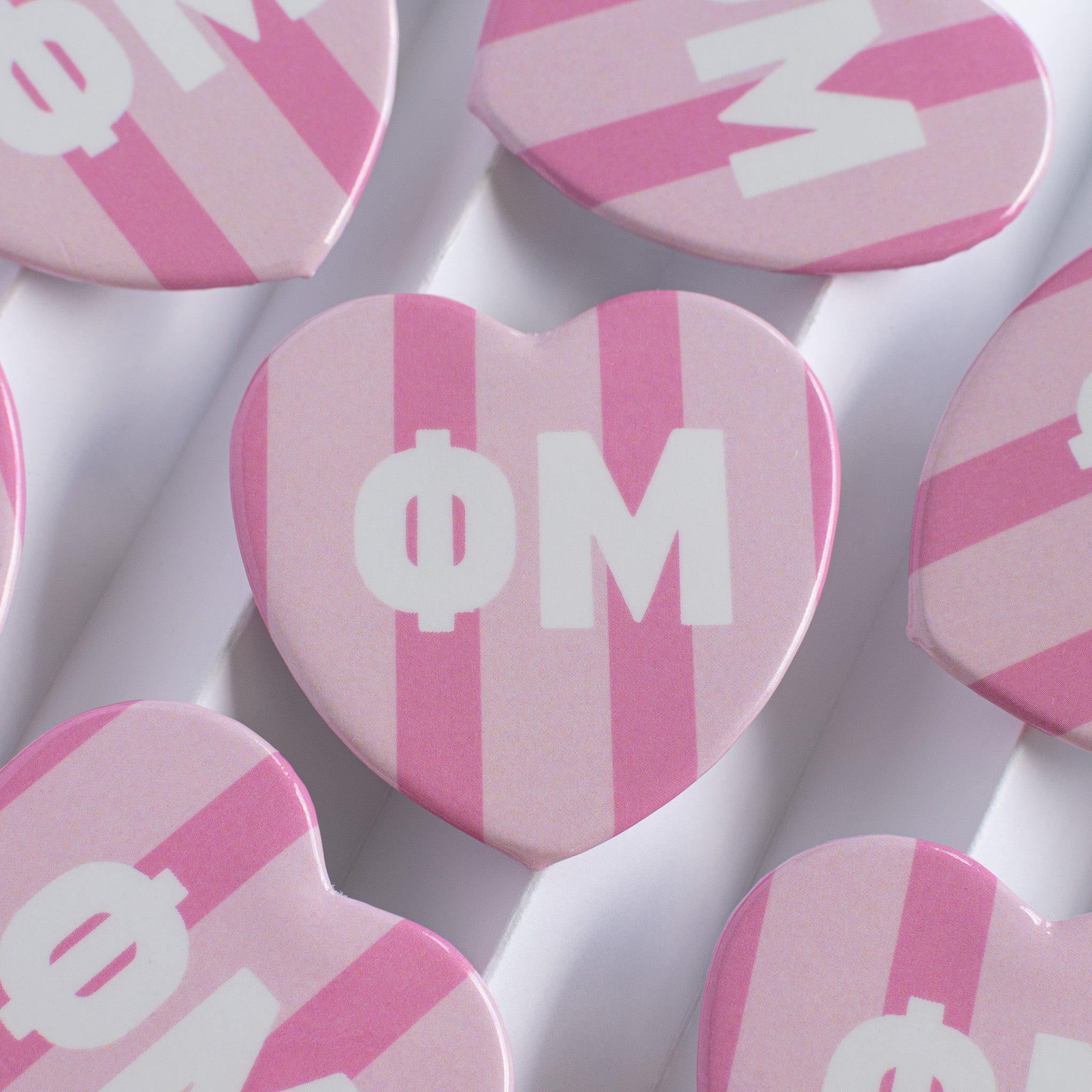 Stripe heart buttons