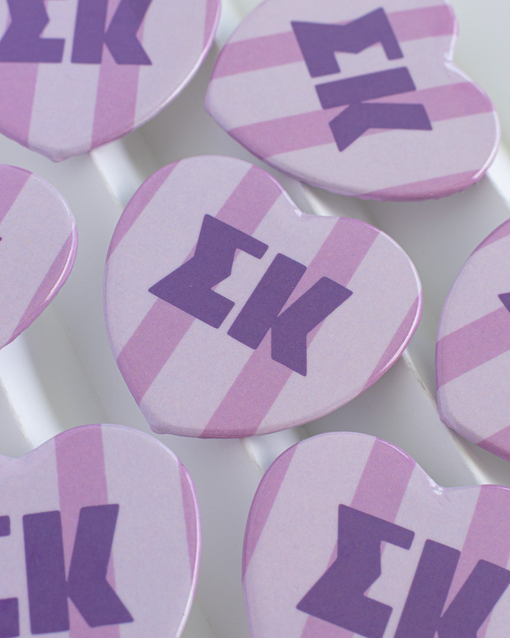 Stripe heart buttons